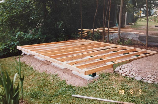 The floor for the shed is then built and leveled.